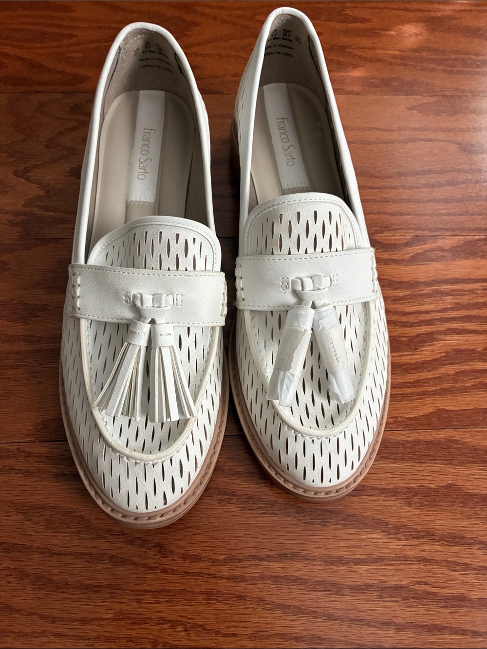 Franco Sarto Cream Perforated Tassel Loafers